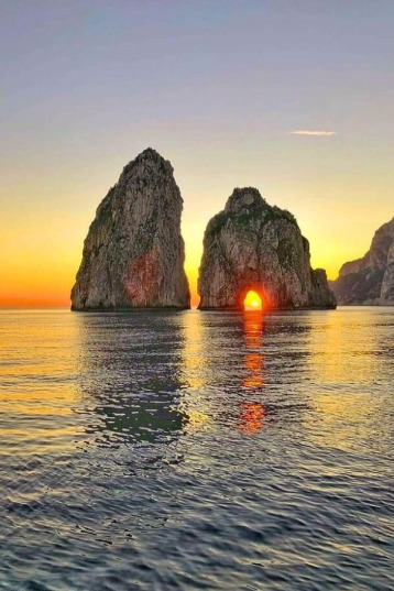 Faraglioni Rocks at sunset