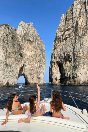 Explore Faraglioni Rocks of Capri by boat